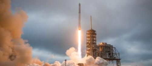 SpaceX postpones launch of communications satellite on its Falcon ... - theverge.com