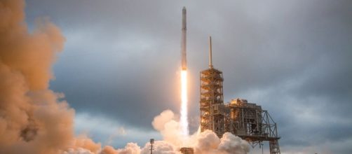 SpaceX postpones launch of communications satellite on its Falcon ... - theverge.com
