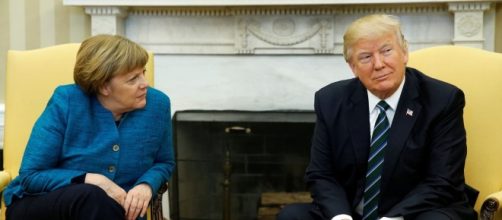 Awkward moment as Donald Trump 'IGNORES' Angela Merkel's offer of ... - mirror.co.uk