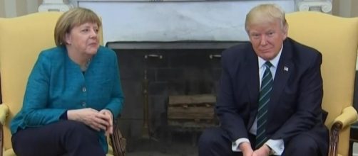 Donald Trump ignores handshake request from Angela Merkel in front ... - thesun.co.uk