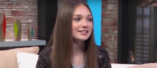 Maddie Ziegler is a lot happier now after leaving the hit show, "Dance Moms." (via YouTube - People)