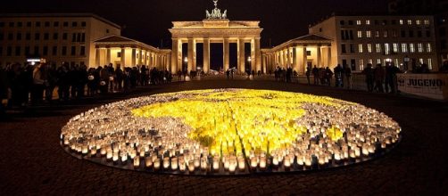 Earth Hour observance at the Brandenburg Gate in Berlin in 2012 (David Biene-WWF/Wikimedia Commons).