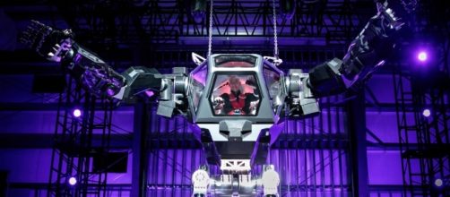 PICTURE: Amazon CEO Jeff Bezos pilots 13-foot high robot at ... - businessinsider.com
