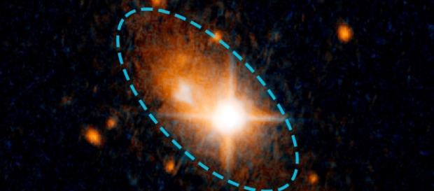 Gravitational Wave Kicks Monster Black Hole Out of Galactic Core ... - spaceref.com Gravitational Wave Kicks Monster Black Hole Out of Galactic Core ... - spaceref.com