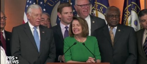 House Democrat leader Nancy Pelosi celebrate GOP failure to repeal ACA with party / Photo screenshot, PBS Newshour / Blasting News library