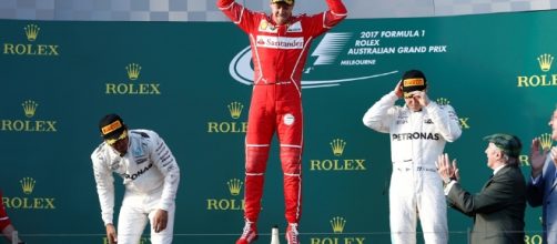 F1: La Ferrari di Sebastian Vettel sul gradino più alto del podio. ABS-CBN News - abs-cbn.com