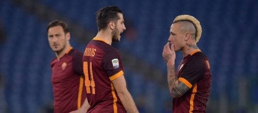 Kostas Manolas e Radja Nainggolan con Totti.