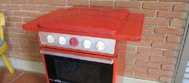 O fogão vermelho era usado várias casas antigamente O fogão vermelho era usado várias casas antigamente