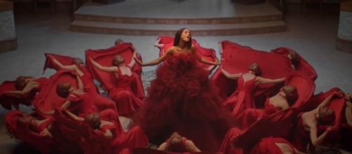 The enchanted rose 'opens' in Ariana Grande and John Legend's 'Beauty and the Beast' music video / Photo from 'Digital Spy' - digitalspy.com