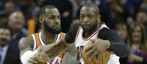 LeBron James and Dwyane Wade could meet up in a postseason series. [Image via Blasting News image library/inquisitr.com]