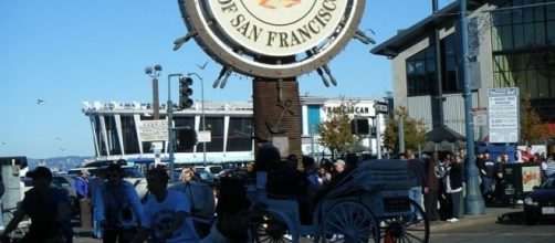 San Francisco tourists crowd Fisherman's Wharf on the city's northern shore in 2008. Photo: Nicholas A. Chadwick /Wikimedia Commons)