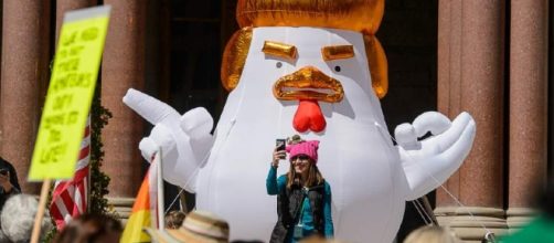 With Trump-chicken as their mascot, hundreds rally for president ... - sltrib.com