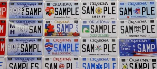 Officials unveil new Oklahoma license plate with state bird design. Photo courtesy of Tulsa World – tulsaworld.com
