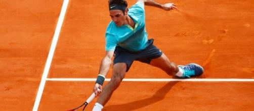 Roger Federer on clay (Credit: rollingstone.com)
