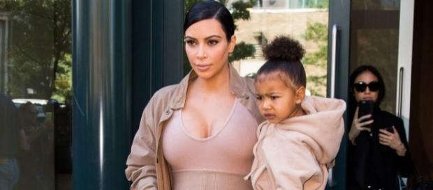 Kim Kardashian attends Ariana Grande concert with daughter North - harpersbazaar.com Kim Kardashian attends Ariana Grande concert with daughter North - harpersbazaar.com