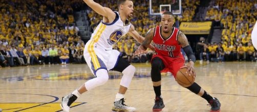 Can Damian Lillard help his team grab an upset road win in Game 2? [Image via Blasting News image library/inquisitr.com]