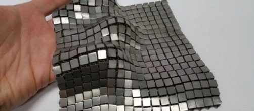 The metallic space fabric appears like a fusion of metallic tiles and chain mail [Image: NASA/JPL-Caltech]