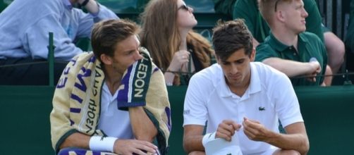 Pierre-Hugues Herbert and Nicolas Mahut during Wimbledon 2016. Photo by Kate -- CC BY-SA 2.0