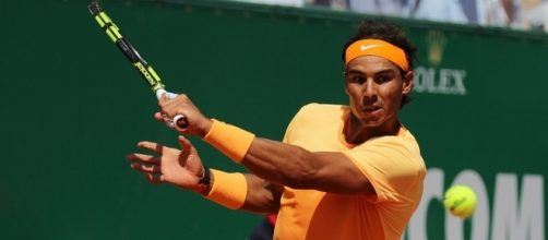 Rafa Nadal plays slice shot. Photo by Marianne Bevis -- CC BY-ND 2.0