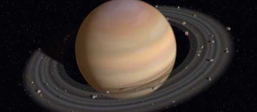 La sonda Cassini tra gli anelli di Saturno