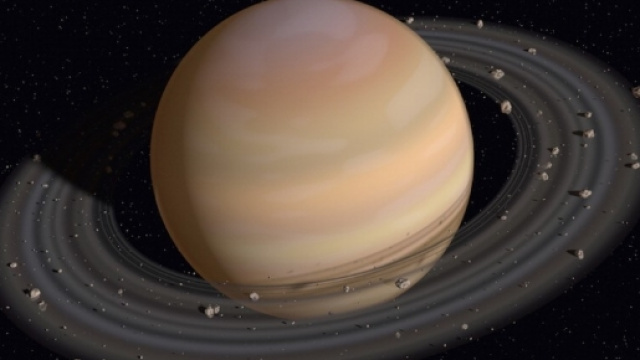 La sonda Cassini tra gli anelli di Saturno