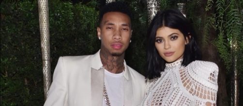 Kylie Jenner's sisters take sides on whether the teen should dump Tyga or take him back. (via YouTube - Hollyscoop)