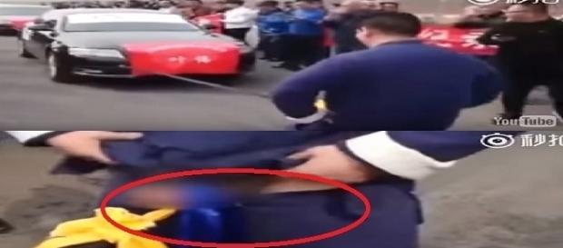Homem puxou sete carros utilizando parte sensível de seu corpo Homem puxou sete carros utilizando parte sensível de seu corpo