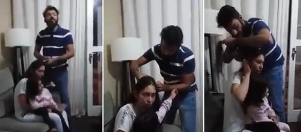 Nas imagens o momento em que o homem começa a cortar o cabelo da própria mulher. Nas imagens o momento em que o homem começa a cortar o cabelo da própria mulher.