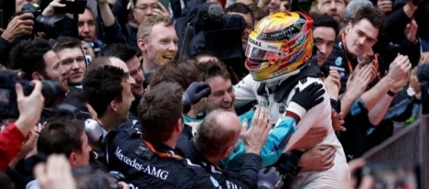 Lewis Hamilton celebrates with his team after winning the Chinese Grand Prix for the fifth time in his career. (Source: thenational.ae) Lewis Hamilton celebrates with his team after winning the Chinese Grand Prix for the fifth time in his career. (Source: thenational.ae)