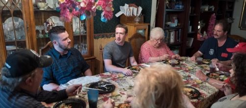 Mark Zuckerberg having dinner with Daniel and Lisa Moore in Ohio.