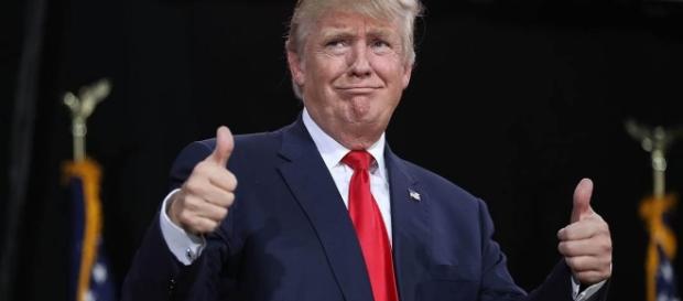 President Trump putting up a thumbs up sign. President Trump putting up a thumbs up sign.