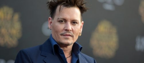 Johnny Depp faces financial crisis after losing millions of his income. Who's to blame? (Photo via - startribune.com)