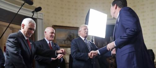 Trump gives FBI Director Comey a pat on the back - POLITICO - politico.com