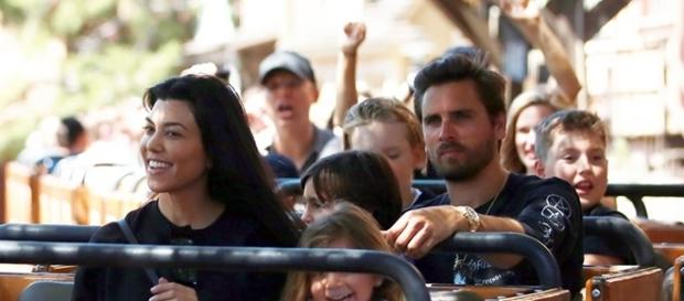 Kourtney Kardashian spent her 38th birthday with her three children and baby daddy, Scott Disick, in Disneyland. (via FameFlynet Pictures) Kourtney Kardashian spent her 38th birthday with her three children and baby daddy, Scott Disick, in Disneyland. (via FameFlynet Pictures)