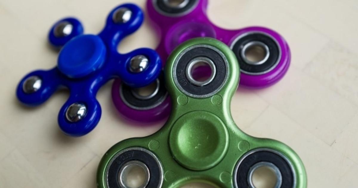 Fidget spinners spin out as schools begin banning this hot toy