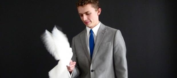 Young magician Alexander Boyce models his style after the 1960s "rat pack" era. / Photo via Alexander Boyce, used with permission. Young magician Alexander Boyce models his style after the 1960s "rat pack" era. / Photo via Alexander Boyce, used with permission.