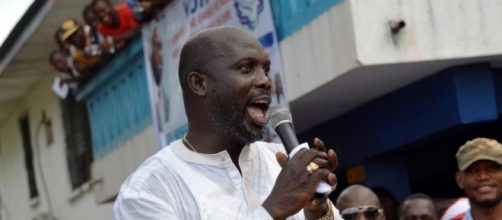 L'ex star del calcio internazionale, George Weah, durante un comizio nella capitale liberiana Monrovia nel 2014. (Fonte: AFP PHOTO / ZOOM DOSSO)