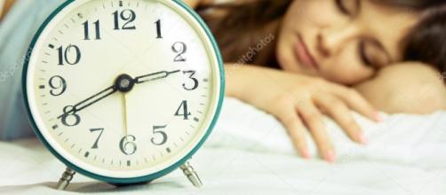 Beautiful sleeping woman with an alarm clock — Stock Photo ... - depositphotos.com