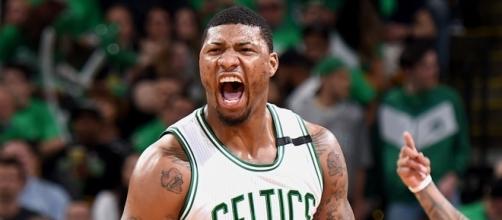 Marcus Smart helped propel the Celtics' shocking road win in Cleveland for Game 3. [Image via Blasting News image library/slamonline.com]