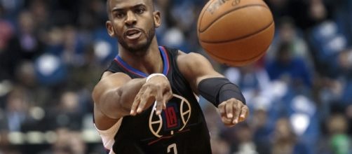 Clippers' guard Chris Paul passing the ball, March 2016 (Brad Rempel via USA Today Sports)