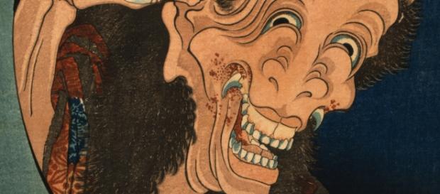 The Laughing demoness, a sharp-fanged image of a horned woman / Photo via Library of Congress The Laughing demoness, a sharp-fanged image of a horned woman / Photo via Library of Congress