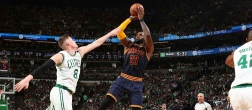 LeBron and the Celtics are moving on to the NBA Finals after routing Boston in Game 5. [Image via Blasting News image library/nba.com]