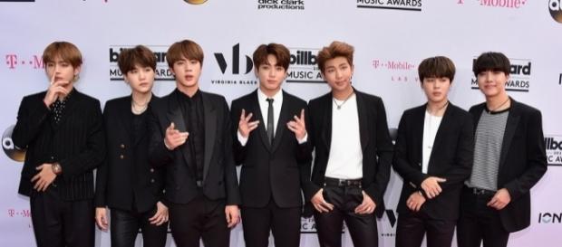 K-Pop band and Top Social Artist BTS pose for Billboard's Magenta Carpet. Photo via Billboard, billboard.com K-Pop band and Top Social Artist BTS pose for Billboard's Magenta Carpet. Photo via Billboard, billboard.com