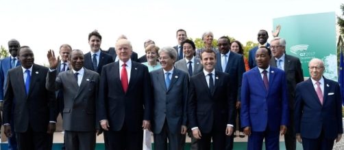 G7 leaders divided on climate change, closer on trade issues | Reuters - reuters.com