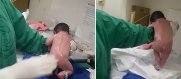 Bebê recém-nascido dá alguns passos apoiado nos braços de enfermeiros (Foto: Reprodução) Bebê recém-nascido dá alguns passos apoiado nos braços de enfermeiros (Foto: Reprodução)