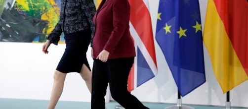 Theresa May puts pressure on Angela Merkel for quick deal after ... - thesun.co.uk