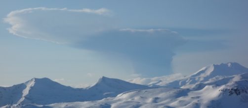 Highest aviation alert level issued after Alaskan volcano erupts: Bogoslof eruption seen from Unalaska Island. / from 'CNN' - cnn.com