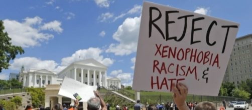 Trump's Muslim Ban Brings Protesters to the White House / Photo via Steve Helber, AP