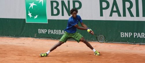Gael Monfils plays backhand shot during practice. Photo by ThoamsB -- CC BY-ND 2.0