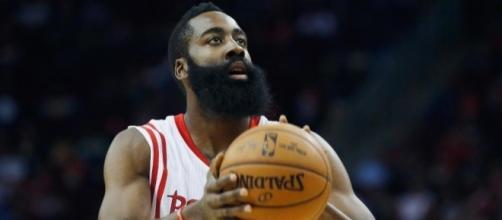 James Harden will try to help the Rockets even things with the Spurs on Sunday night. [Image via Blasting News image library/sportsonearth.com]